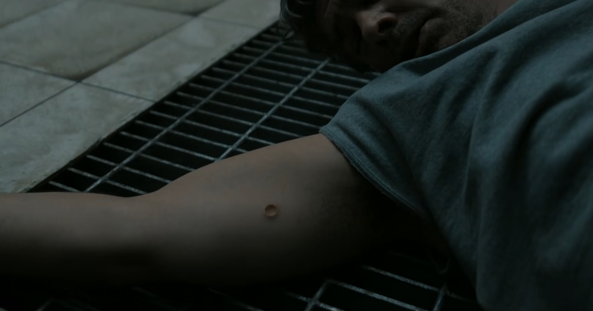 Hal with a mark on his arm in Lanterns